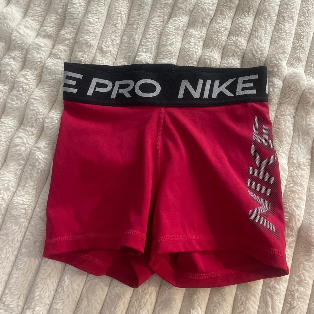red pink nike pros